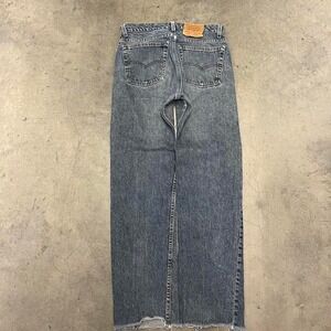 90s USA made grey wash Levi's 505 distressed bottom‎ jeans